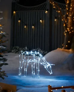 WeRChristmas 3D Twinkling Grazing Reindeer Silhouette, White, 68 Cm^ Outdoor Lighted Reindeer