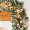 WeRChristmas Pre-Lit Extra Thick Mixed Pine Snow Flocked Garland, Pinecones & Berries, 9 Ft^ Snow Flocked Garlands|Decorated Garlands