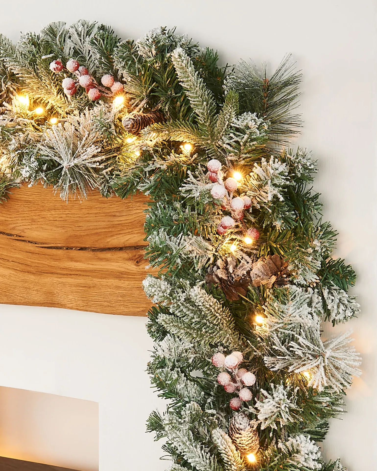 WeRChristmas Pre-Lit Extra Thick Mixed Pine Snow Flocked Garland, Pinecones & Berries, 9 Ft^ Snow Flocked Garlands|Decorated Garlands