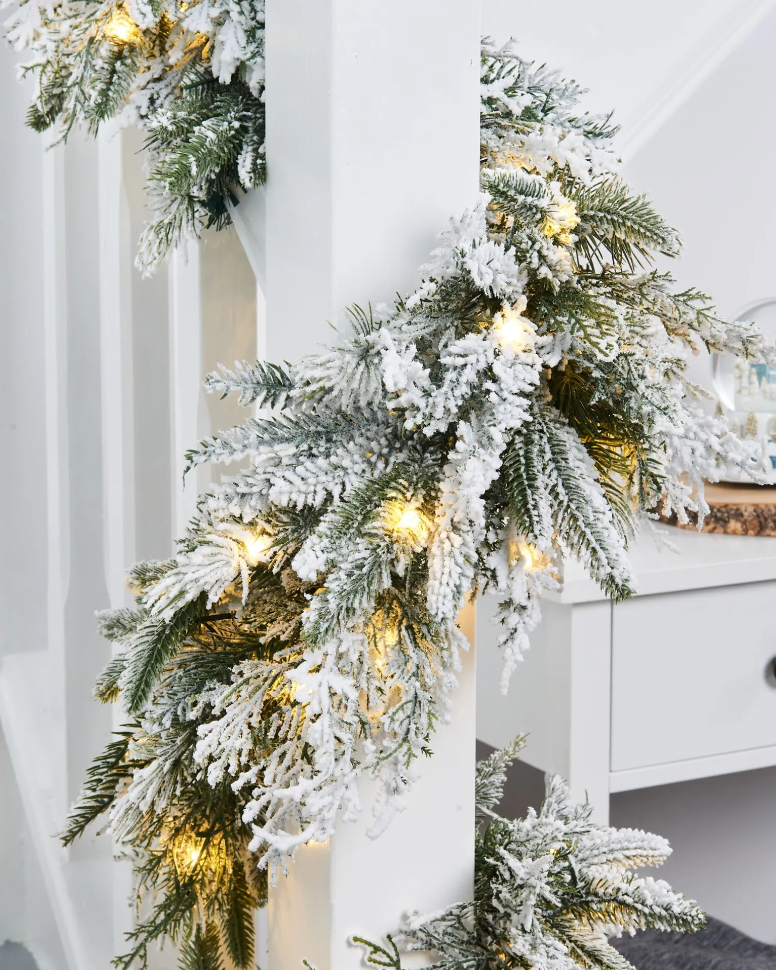 WeRChristmas Pre-Lit Snow Flocked Natural Fir Garland, 18 Ft^ Extra Large Garlands|Snow Flocked Garlands